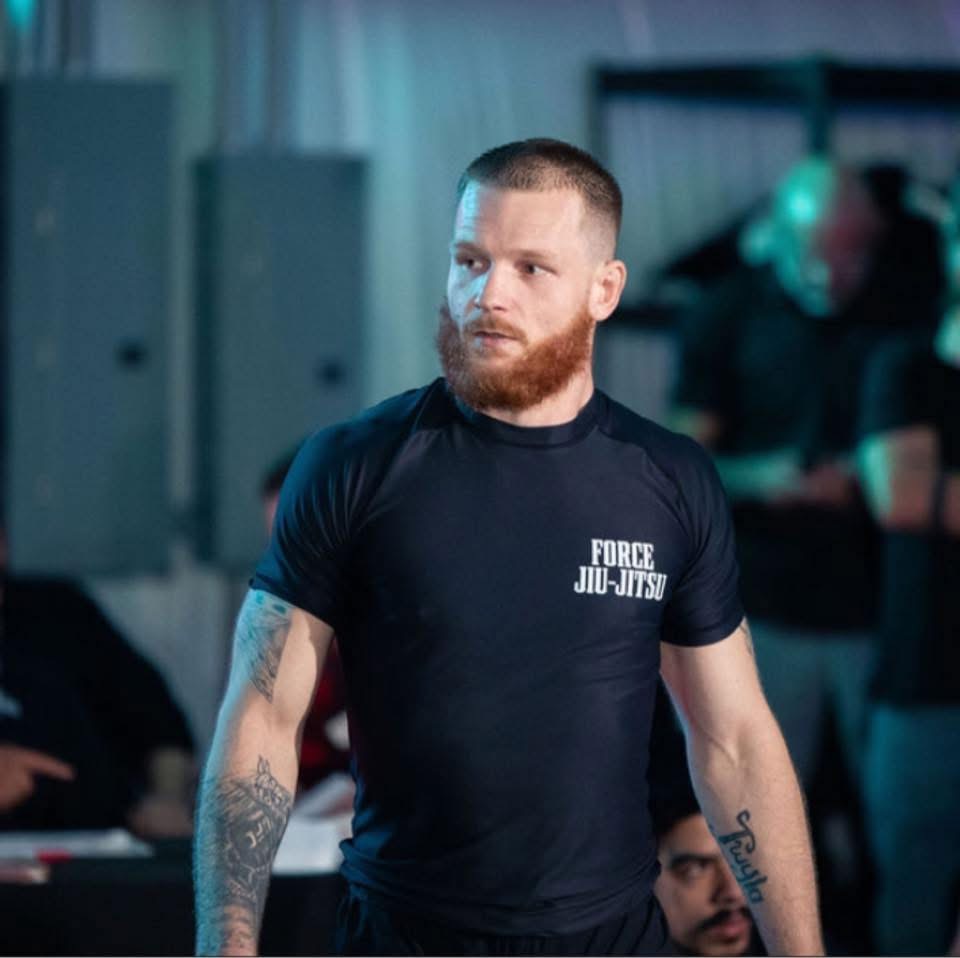 Coach Wyatt Montgomery representing Force Jiu-Jitsu at competition
