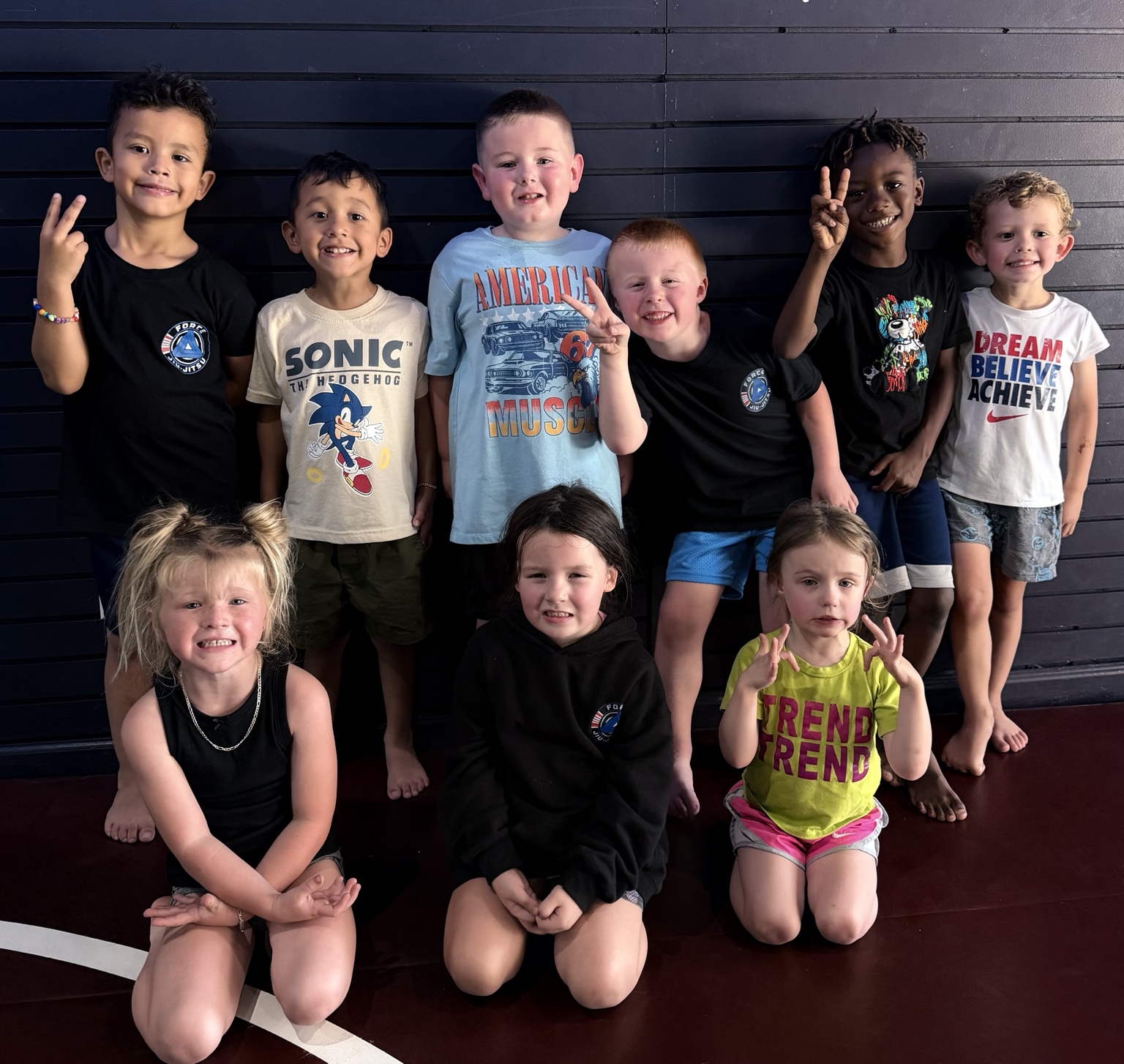 Younglings ages four and five posing together after Jiu-Jitsu class at Force