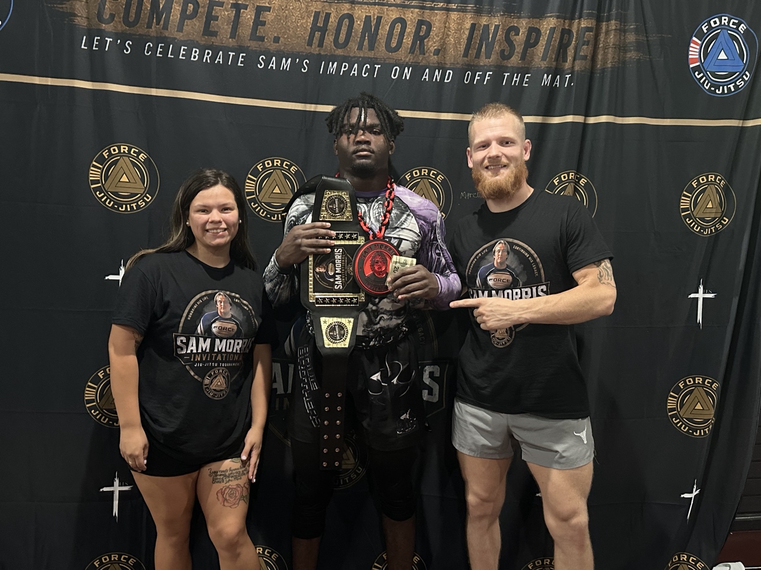 2026 champion Marcus Bouie with Twyla Toledo and Wyatt Montgomery